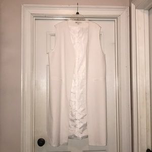 Women’s Long Vest faux pockets.